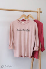 He First Loved Us Long Sleeve Graphic Top - Soft Pink