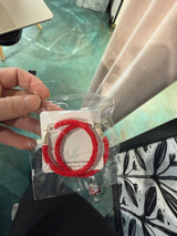 red hoop earring