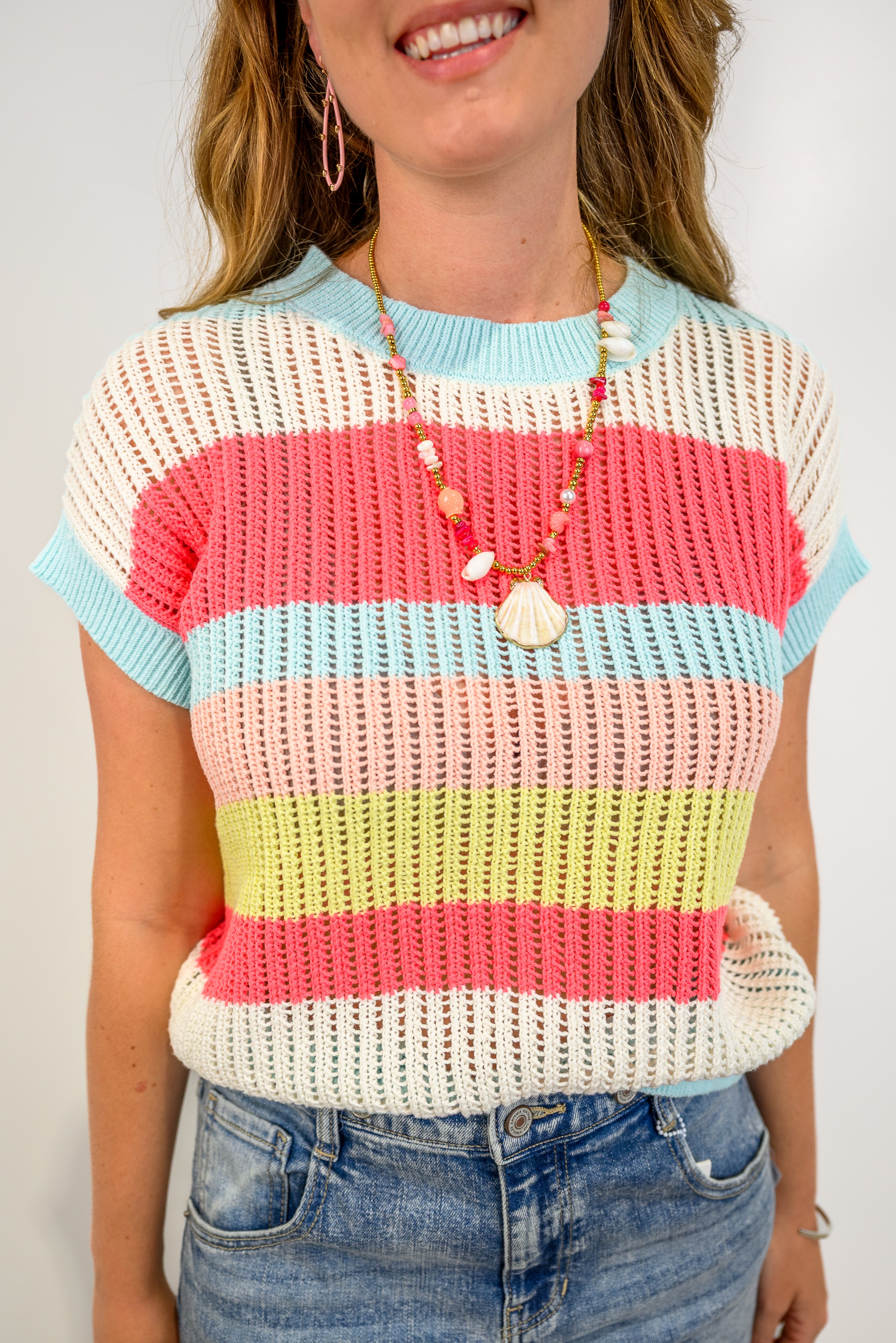 Patch & Peek Knit Sweater
